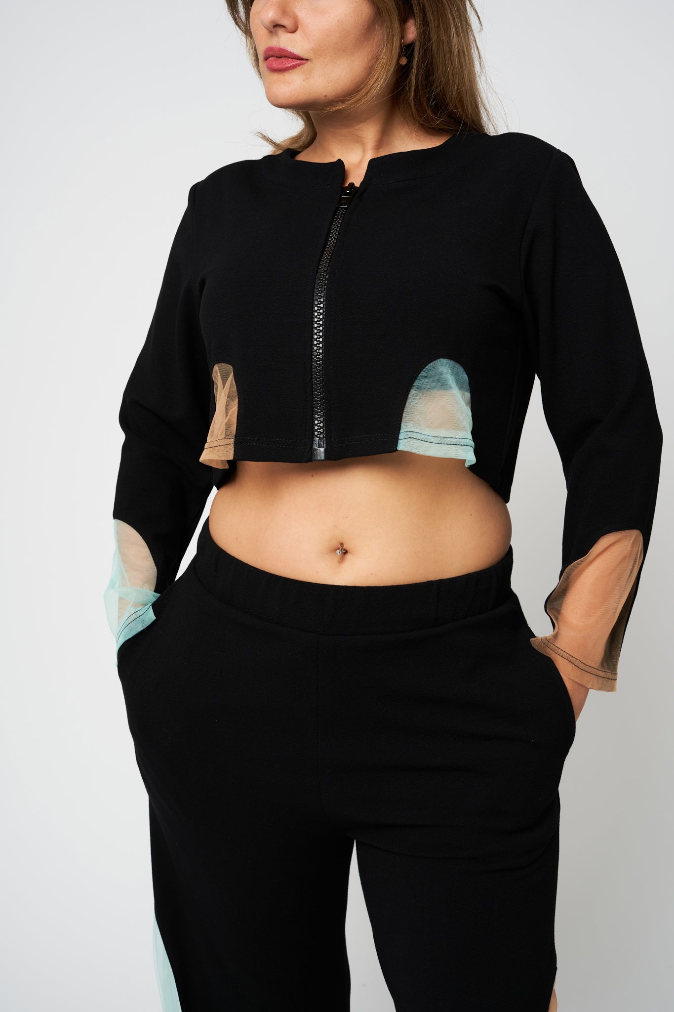 Magnificent Arches Track Suit Black Suit With Mesh Details - front zoomed